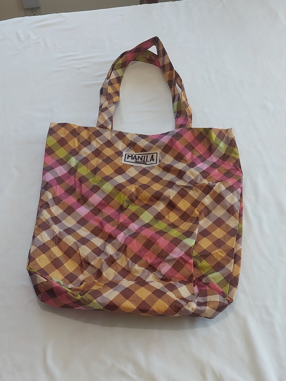 Manila  Plaid Reusable Tote Bag in Multicolor .Plastic .